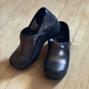 Dansko clogs. Pre owned but in good condition.